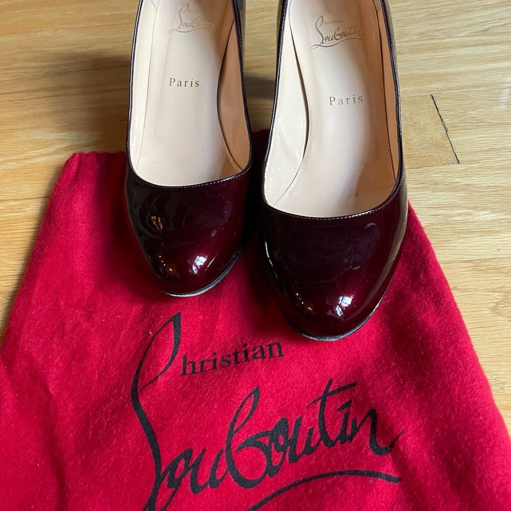 Louboutin rare color red/purple patent pumps